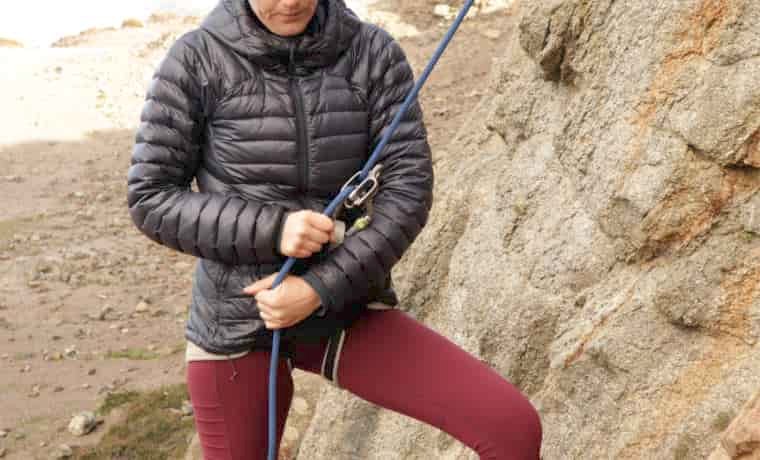 Woman demonstrating how to belay