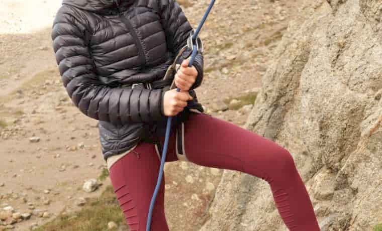 Belayer lowering climber