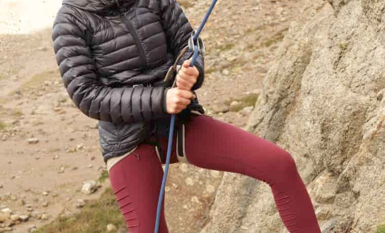Belayer lowering climber