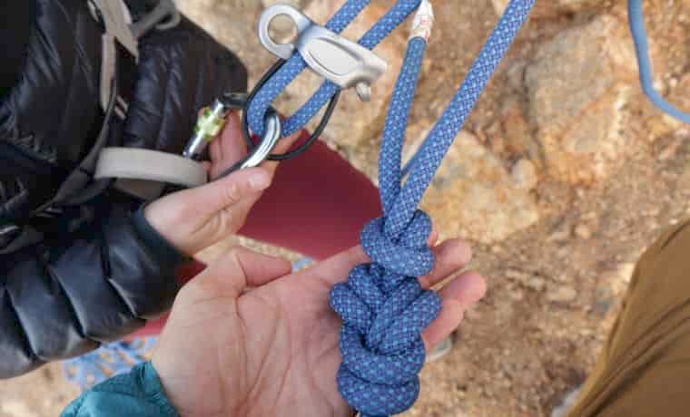 Checking climbing belay setup