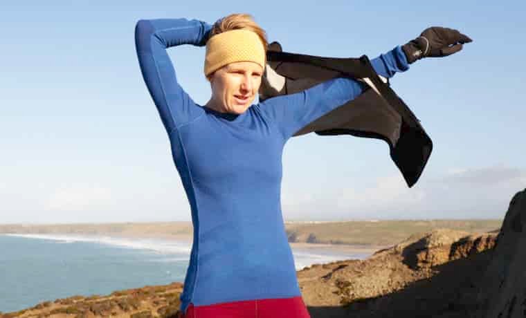 Winter runner wearing blue base layer