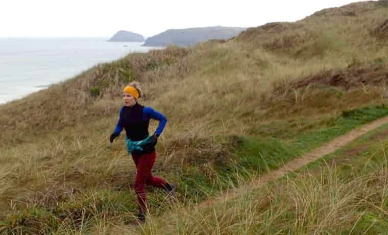 Woman running near the sea