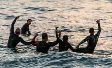 Surfers in the water together