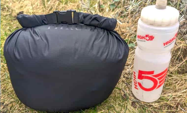 Packet jacked next to water bottle