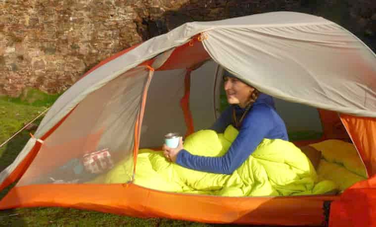 Woman sitting in tent
