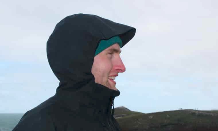 Man wearing jacket with hood up