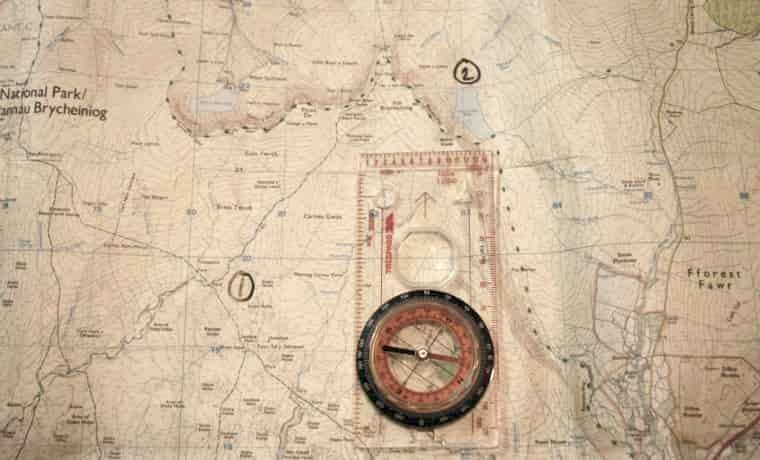 Compass on map
