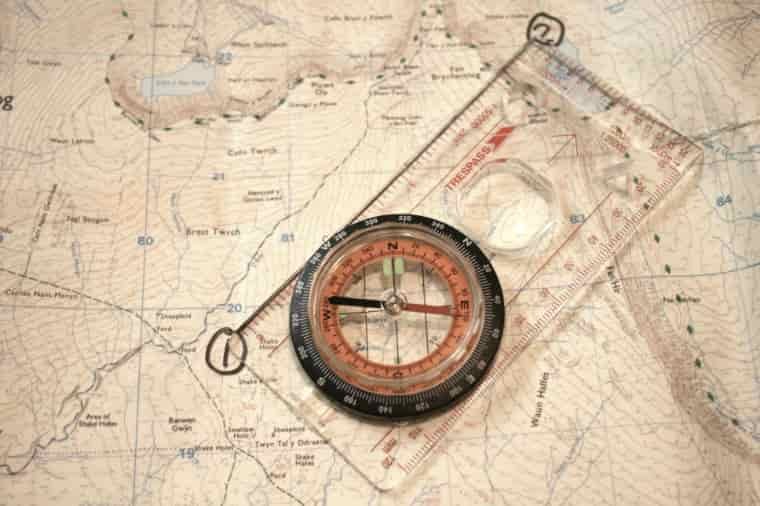 Compass on map