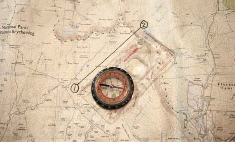 Compass on map