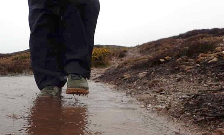 Walking through a deep puddling