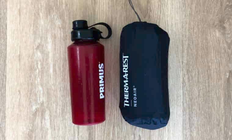 Therm-a-rest next to water bottle