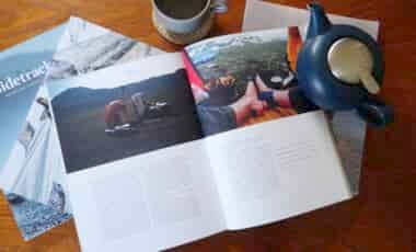 Backpacking magazines on table