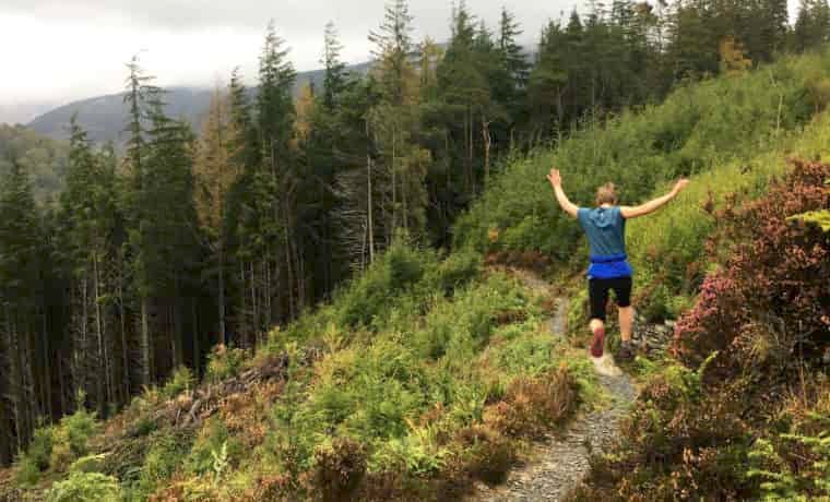 Woman running on the trail