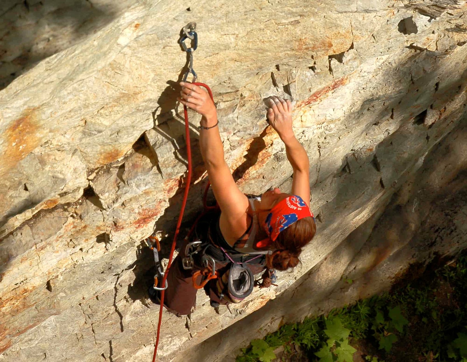 climber clipping quickdraw