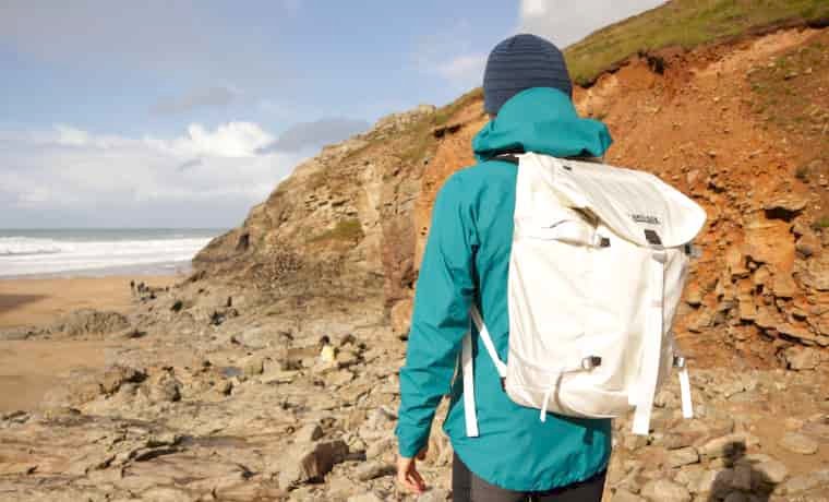 Hiker carrying backpack