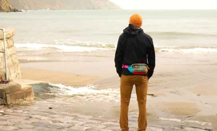 Man standing by the sea