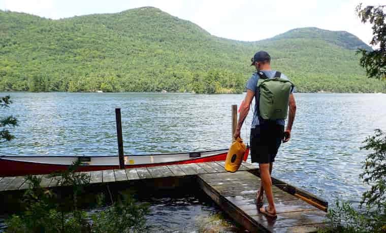 Man walking to canoe
