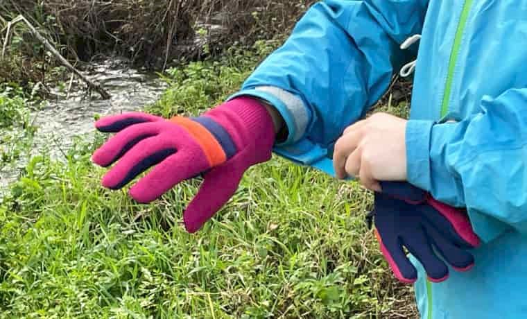 Putting gloves on