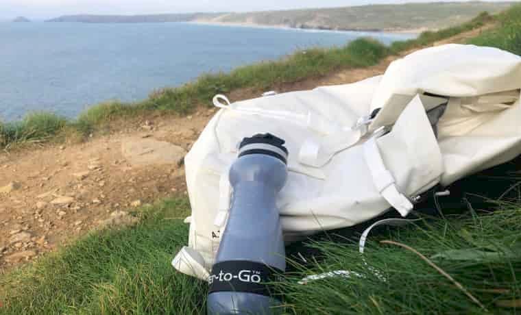 Water bottle next to bag