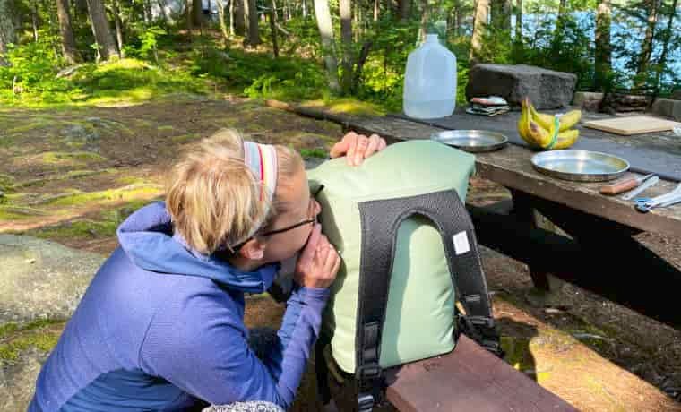 Woman using cooler bag