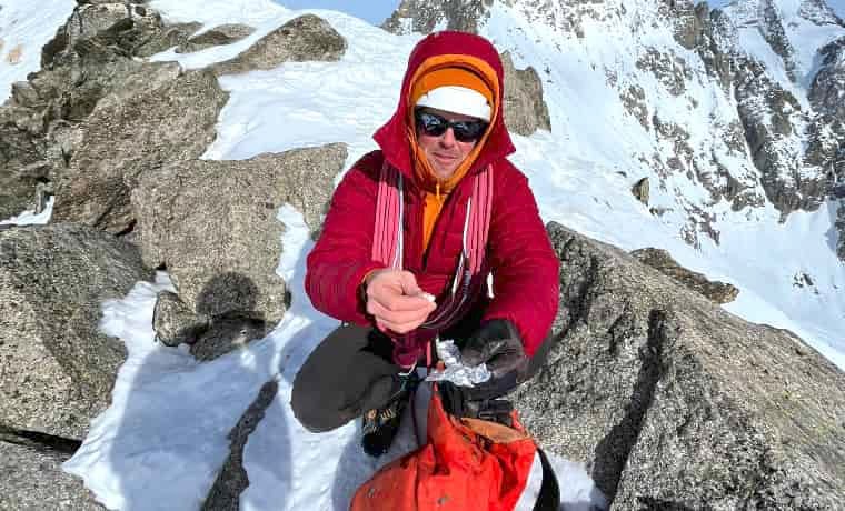 Mountaineer wearing red jacket