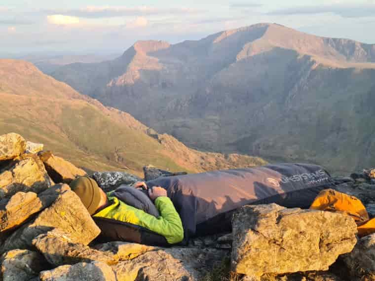 Man in bivy bag