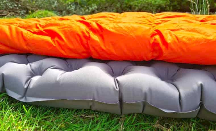 Camping mat with sleeping bag