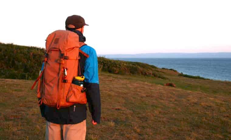 Man hiking in backpack