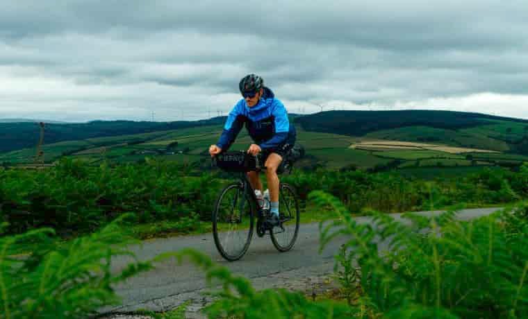 Cyclist in blue jacket
