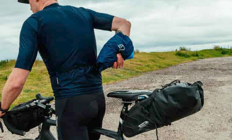Cyclist packing lightweight jacket