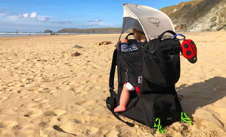 Baby carrier on beach