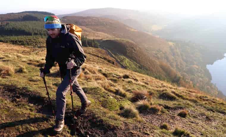 Man hiking in black jacket