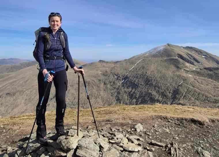 Woman hiking in scarpa boots and gaiters
