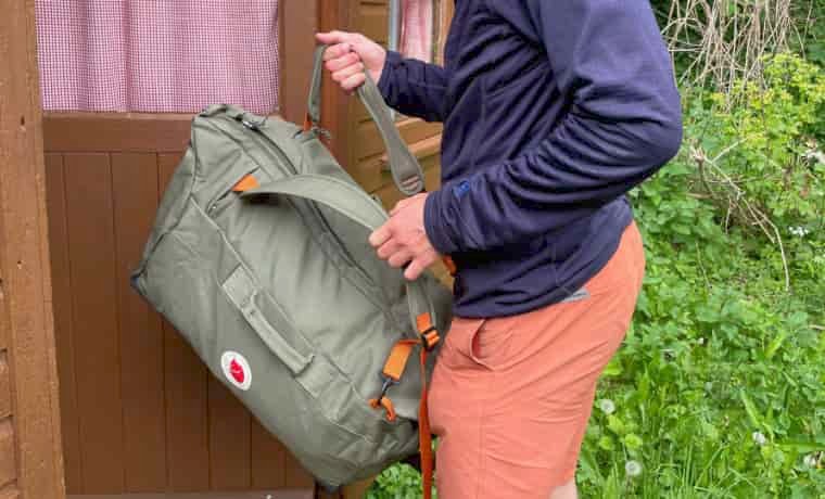 Man carrying duffel