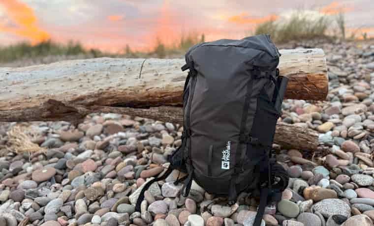 Black backpack at sunset