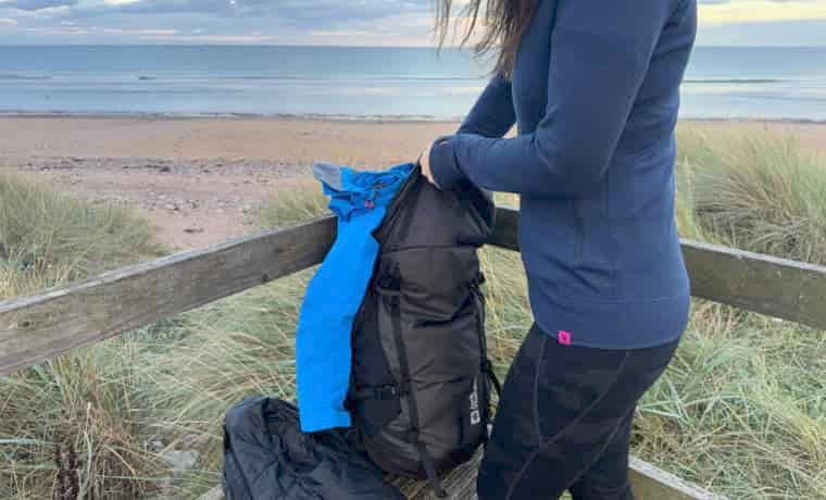 Woman packing daypack